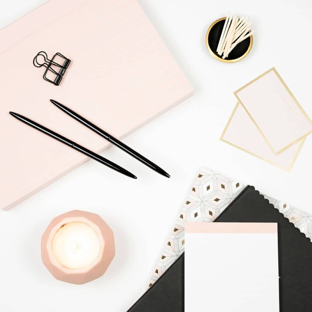 Professional workspace with stationery - ongoing design support and retainer services